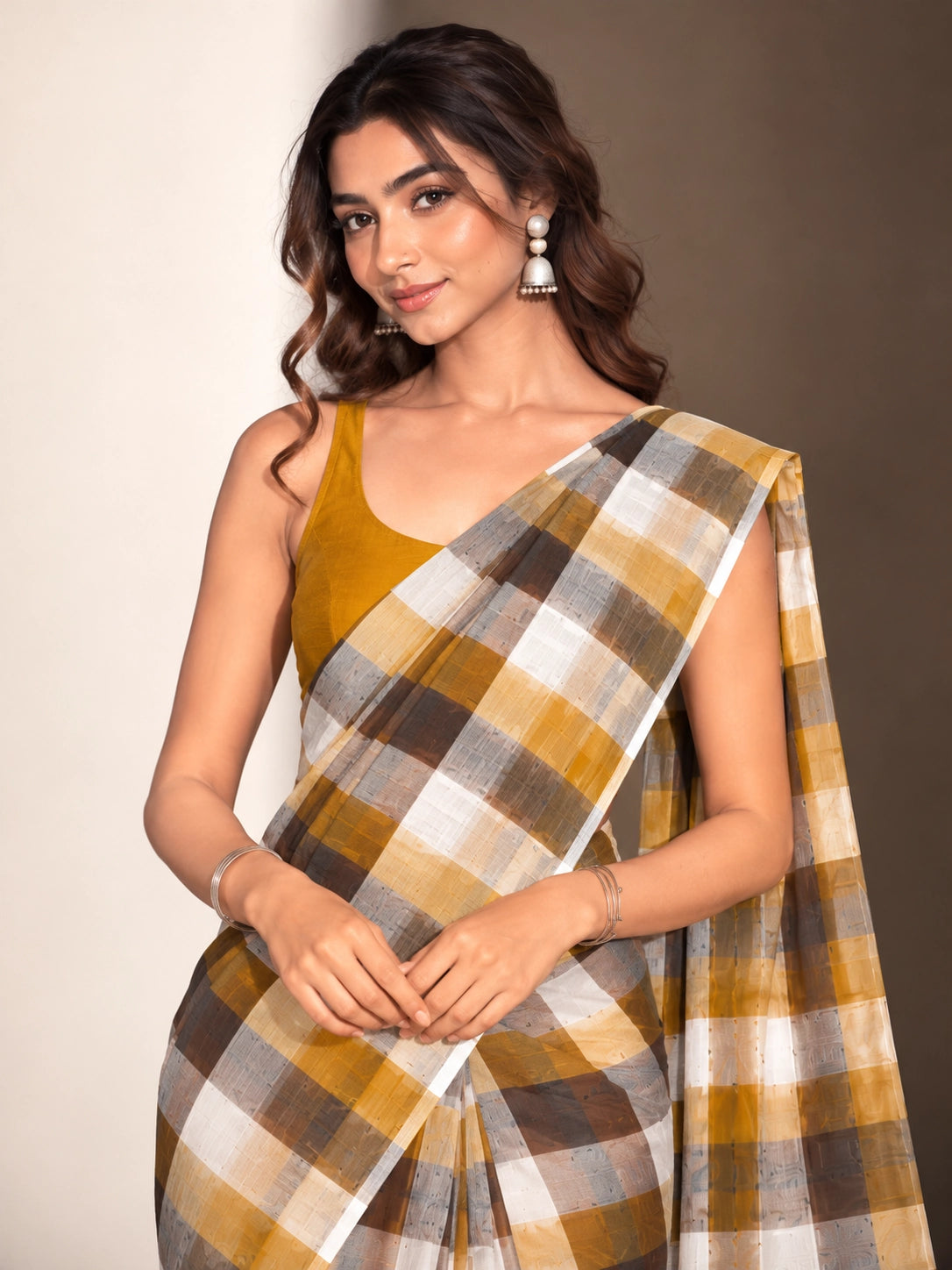 Designer Woven Saree with Checks Pattern & Elegant Tassel Border