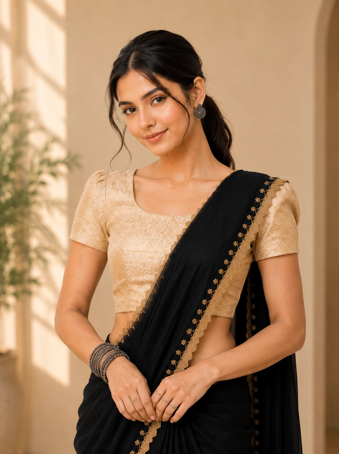 Elegant Black Saree with Gold Embroidered Border and Blouse