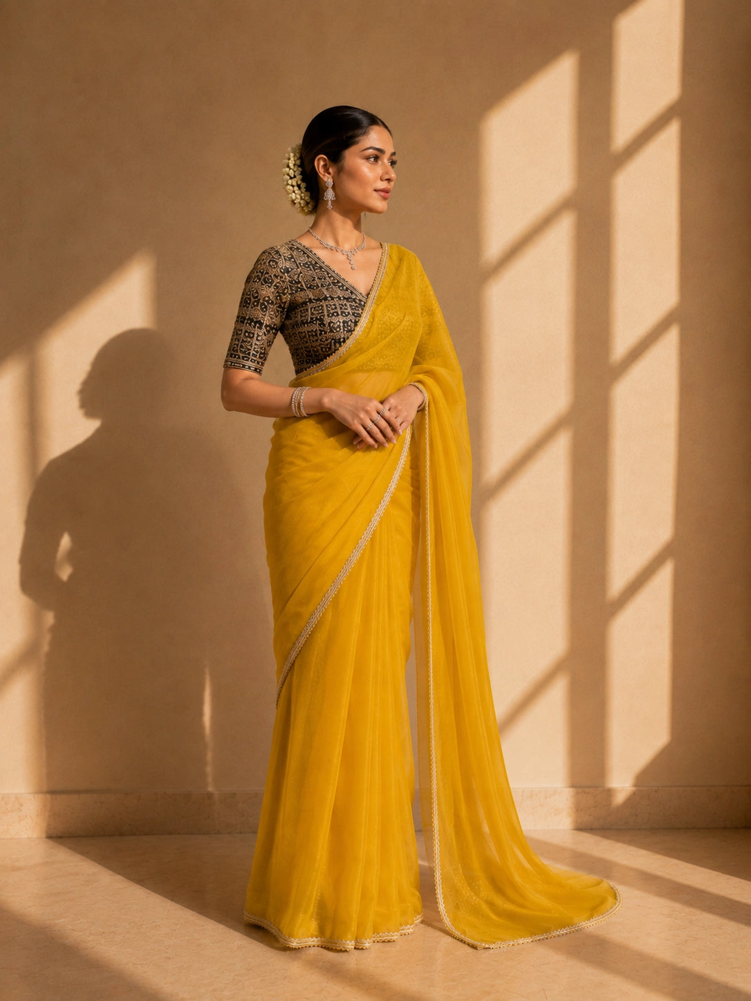 Elegant Mustard Saree with Black Brocade Blouse