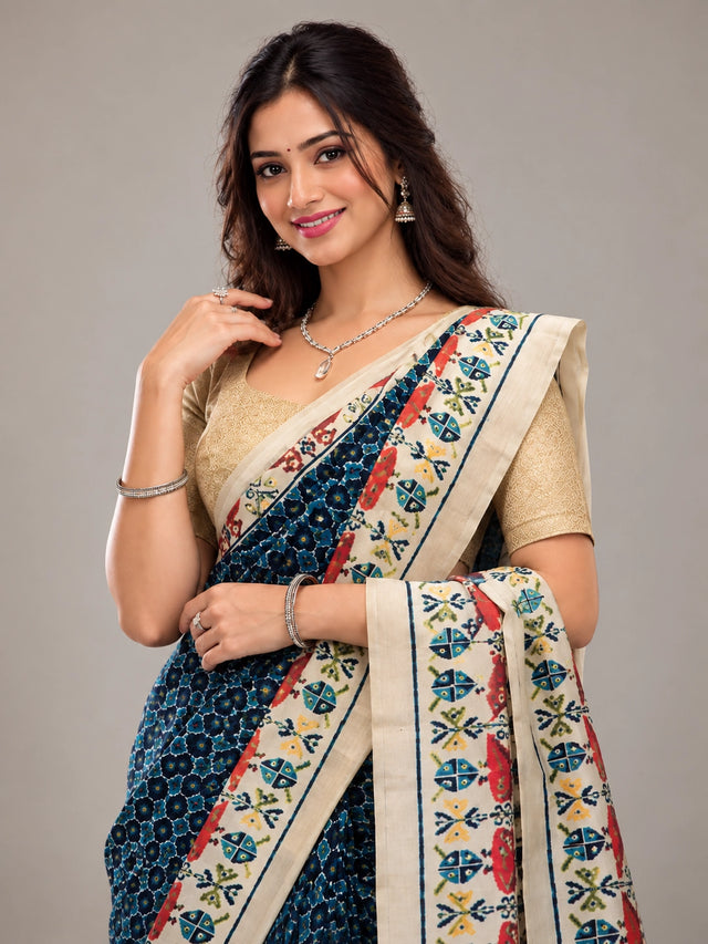 Elegant Navy Blue  Ikat Saree with Golden Blouse