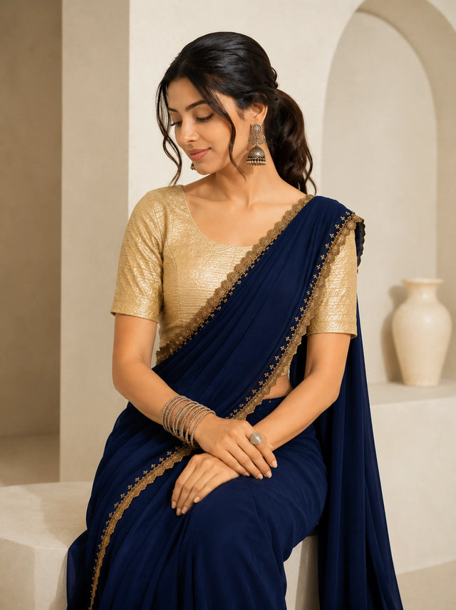 Chic Navy Blue Saree with Embellished Gold Blouse
