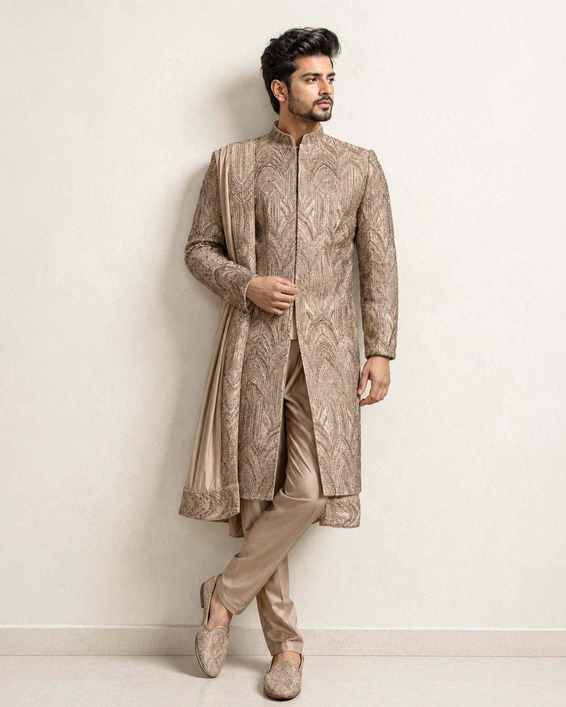 A man wearing an elegant Chikoo Sherwani, perfect for weddings and festive occasions.