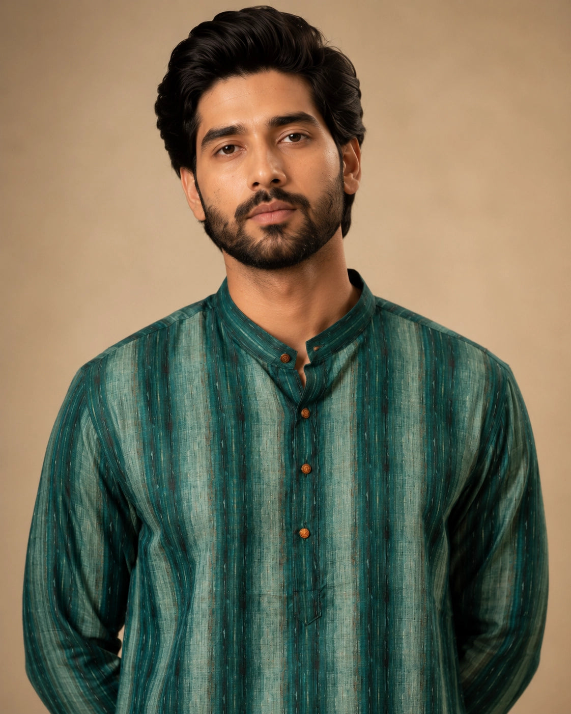 Man wearing a C.Teal striped kurta with white pajama and brown loafers.
