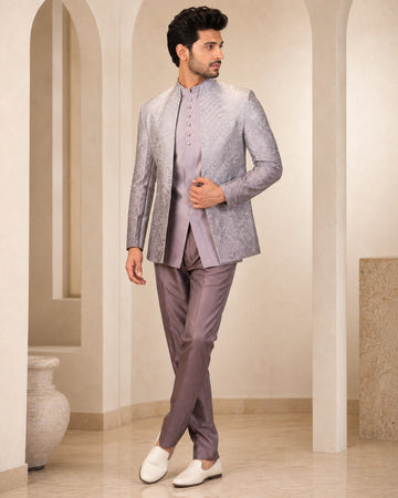 Man wearing a stylish grey Indowestern suit, perfect for formal events and celebrations.