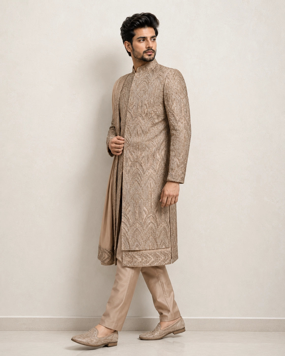 A man wearing an elegant Chikoo Sherwani, perfect for weddings and festive occasions.
