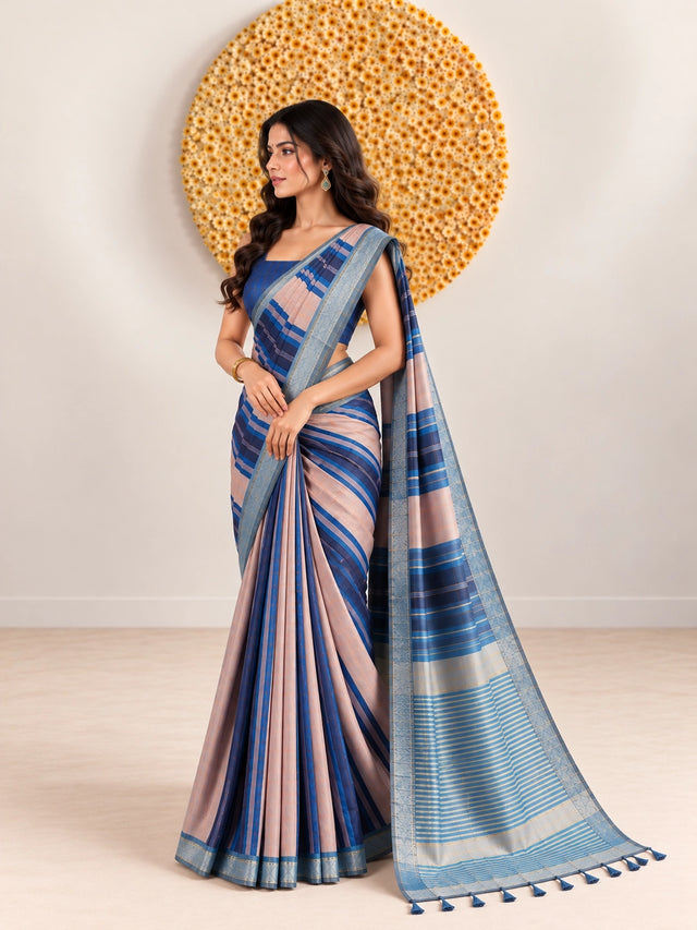 Woman in an elegant blue and pink striped saree with a detailed border.