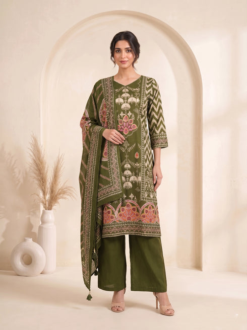 Woman wearing an olive green printed kurti set with palazzo pants and a matching dupatta.