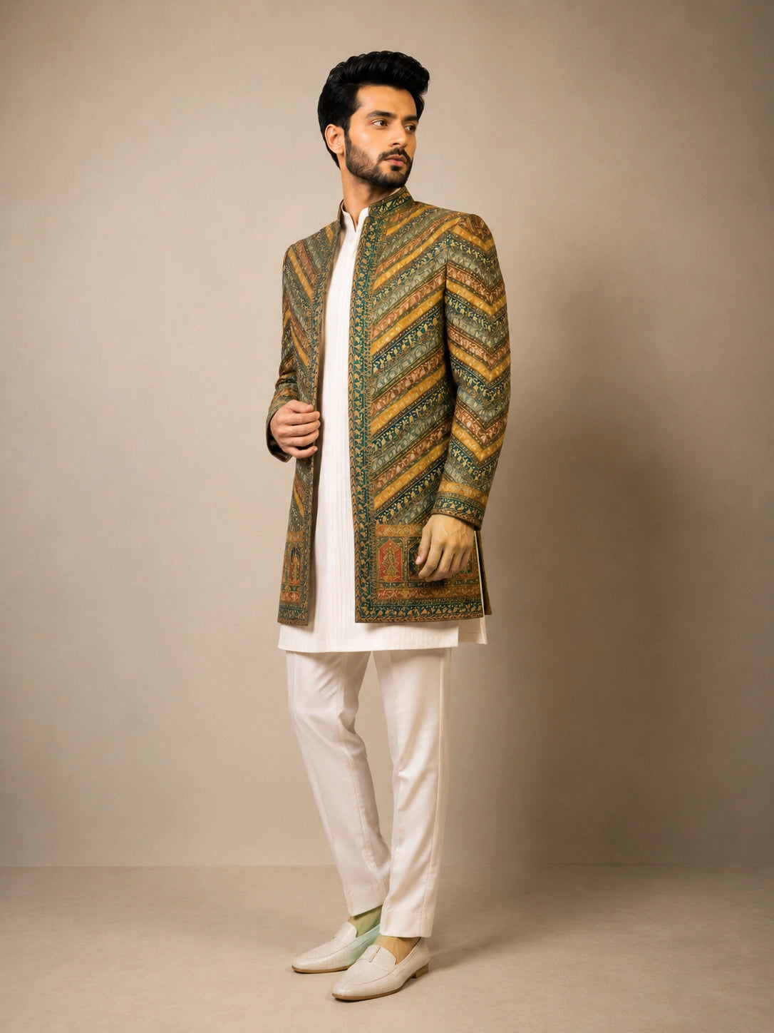 Elegant M.Green Indowestern ensemble featuring intricate details, perfect for festive celebrations.
