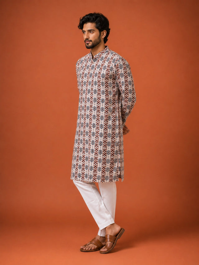 Man wearing a W.Green printed kurta with geometric pattern and white pajama.