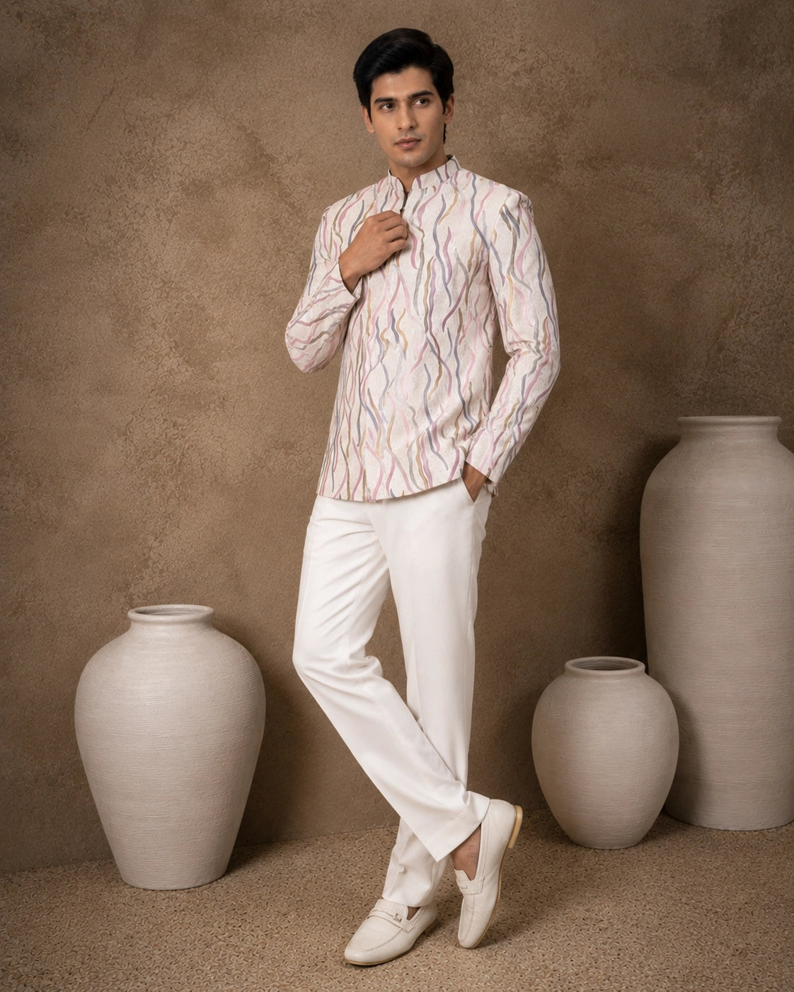 Men's royal purple Jodhpuri suit, a traditional Indian ethnic wear for formal events.