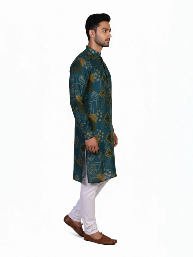 Man wearing a teal kurta with a multi-color geometric print and white pants, standing against a white background.