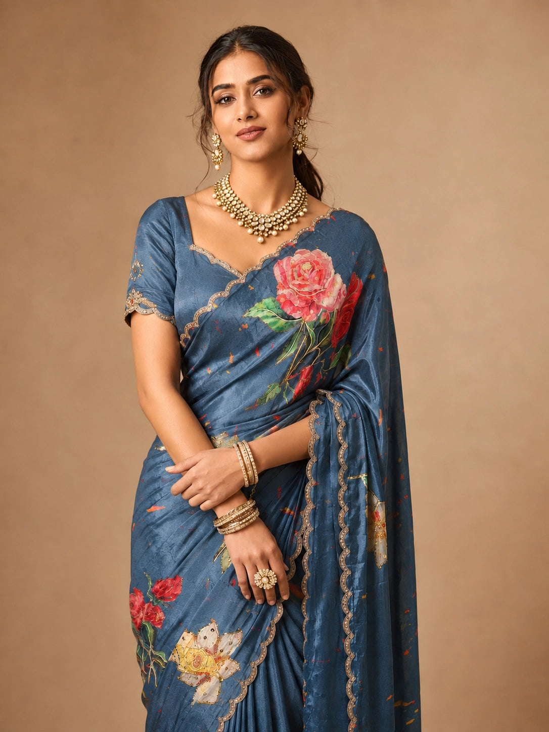 Woman wearing an elegant SKY blue  floral printed saree with a scalloped border.