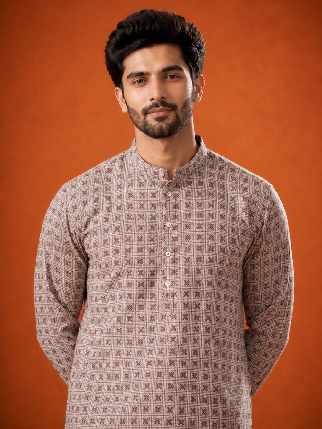 Man wearing P.IVORY geometric print kurta with white pajama and brown loafers.