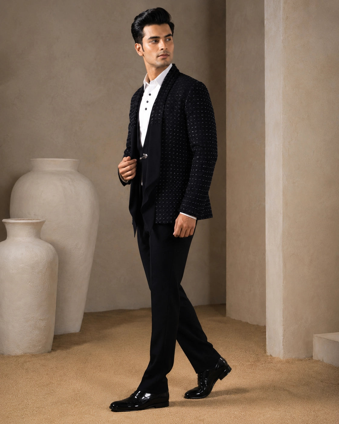 A classic navy taxido suit, perfect for formal events and special occasions.