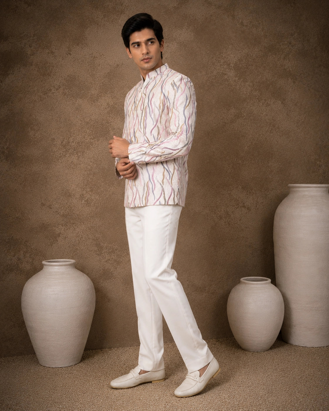 Men's royal purple Jodhpuri suit, a traditional Indian ethnic wear for formal events.