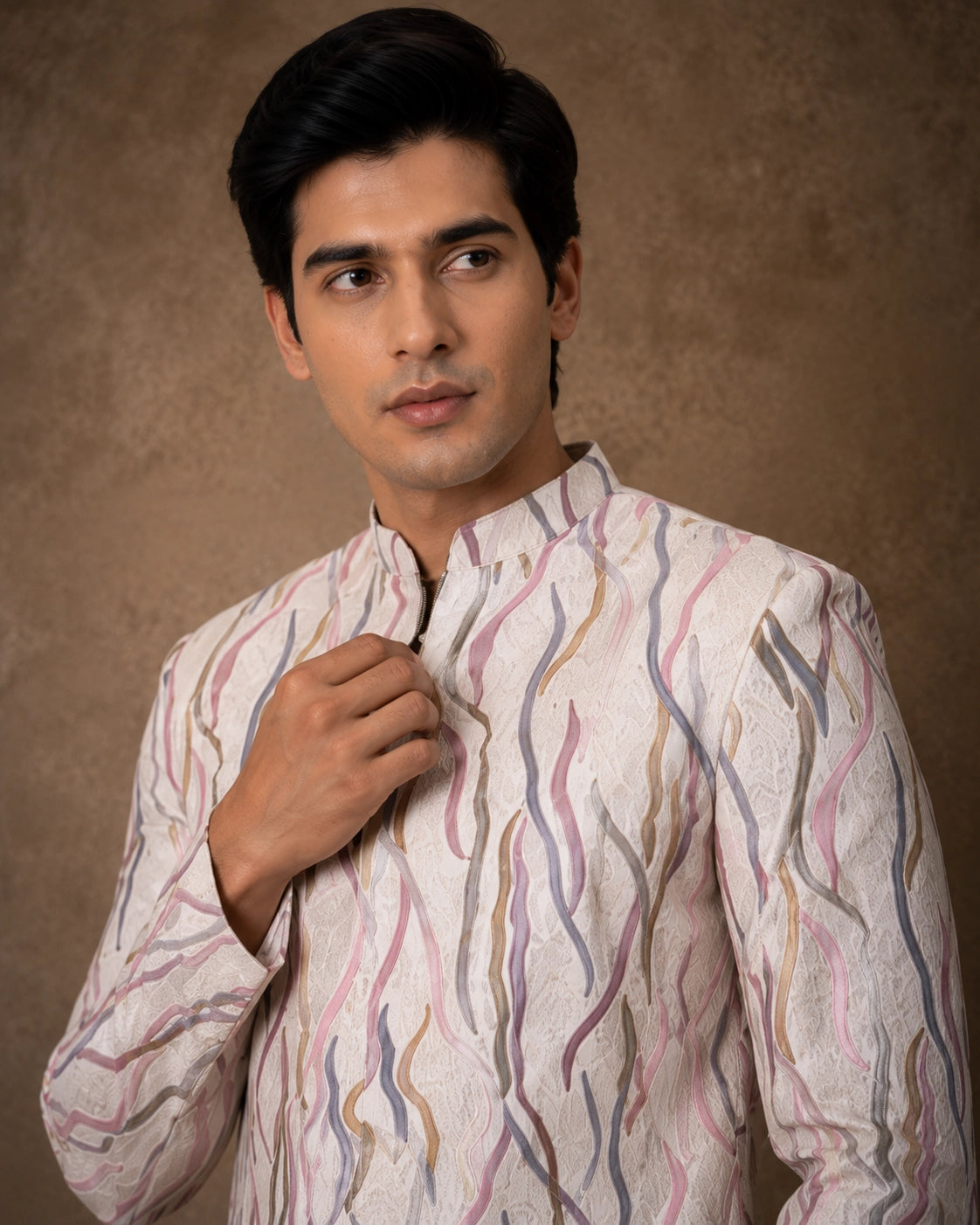 Men's royal purple Jodhpuri suit, a traditional Indian ethnic wear for formal events.