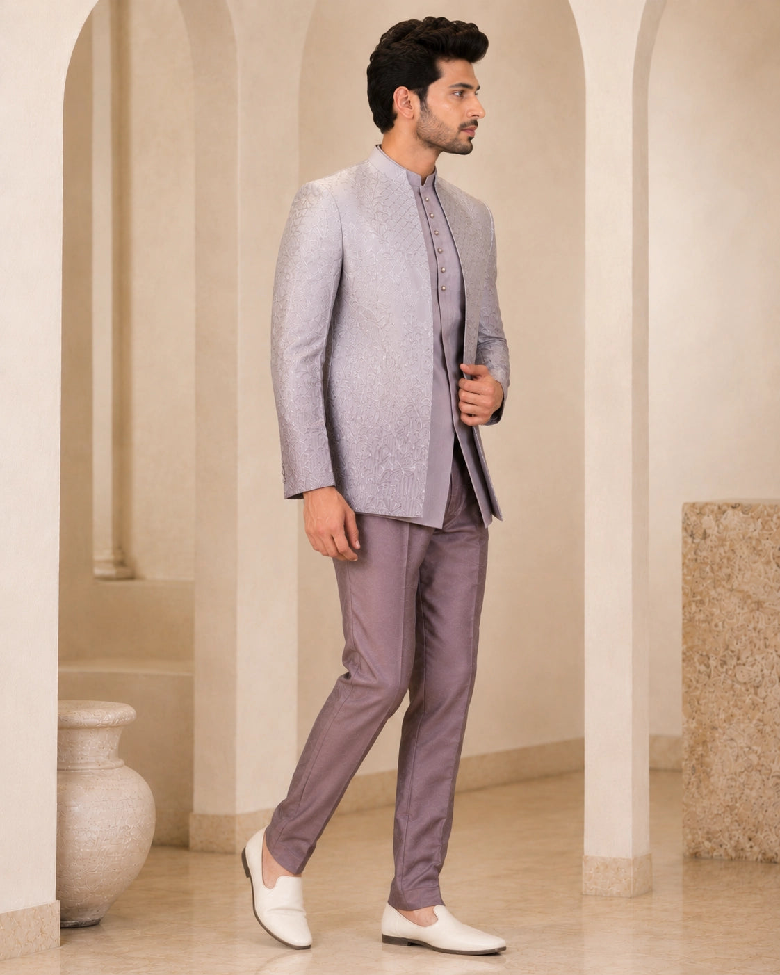 Man wearing a stylish grey Indowestern suit, perfect for formal events and celebrations.