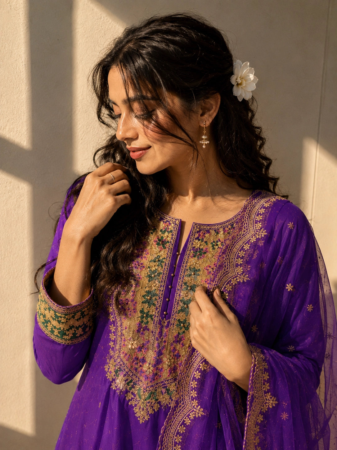 Elegant purple RM palazzo suit featuring detailed gold embroidery and a sheer scalloped dupatta.