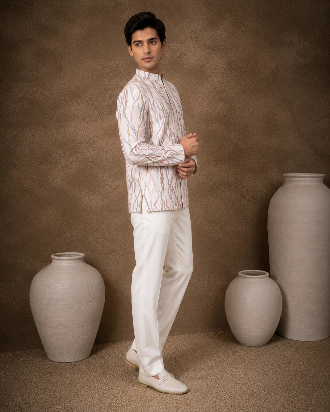 Men's royal purple Jodhpuri suit, a traditional Indian ethnic wear for formal events.