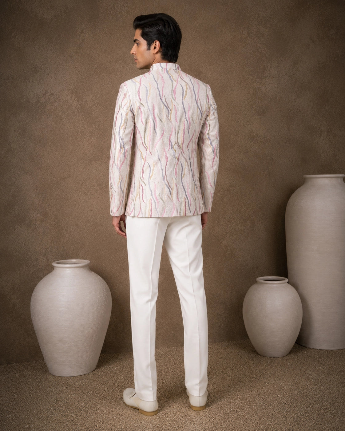 Men's royal purple Jodhpuri suit, a traditional Indian ethnic wear for formal events.