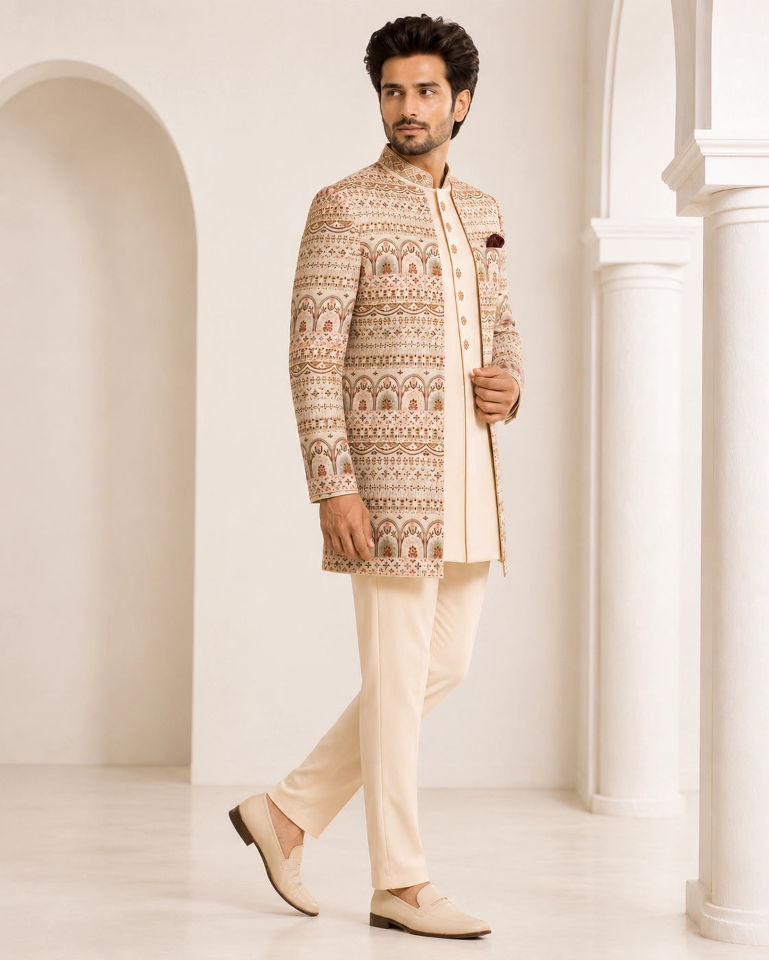 Man wearing an elegant beige Sherwani, showcasing intricate embroidery and a classic fit for formal events.